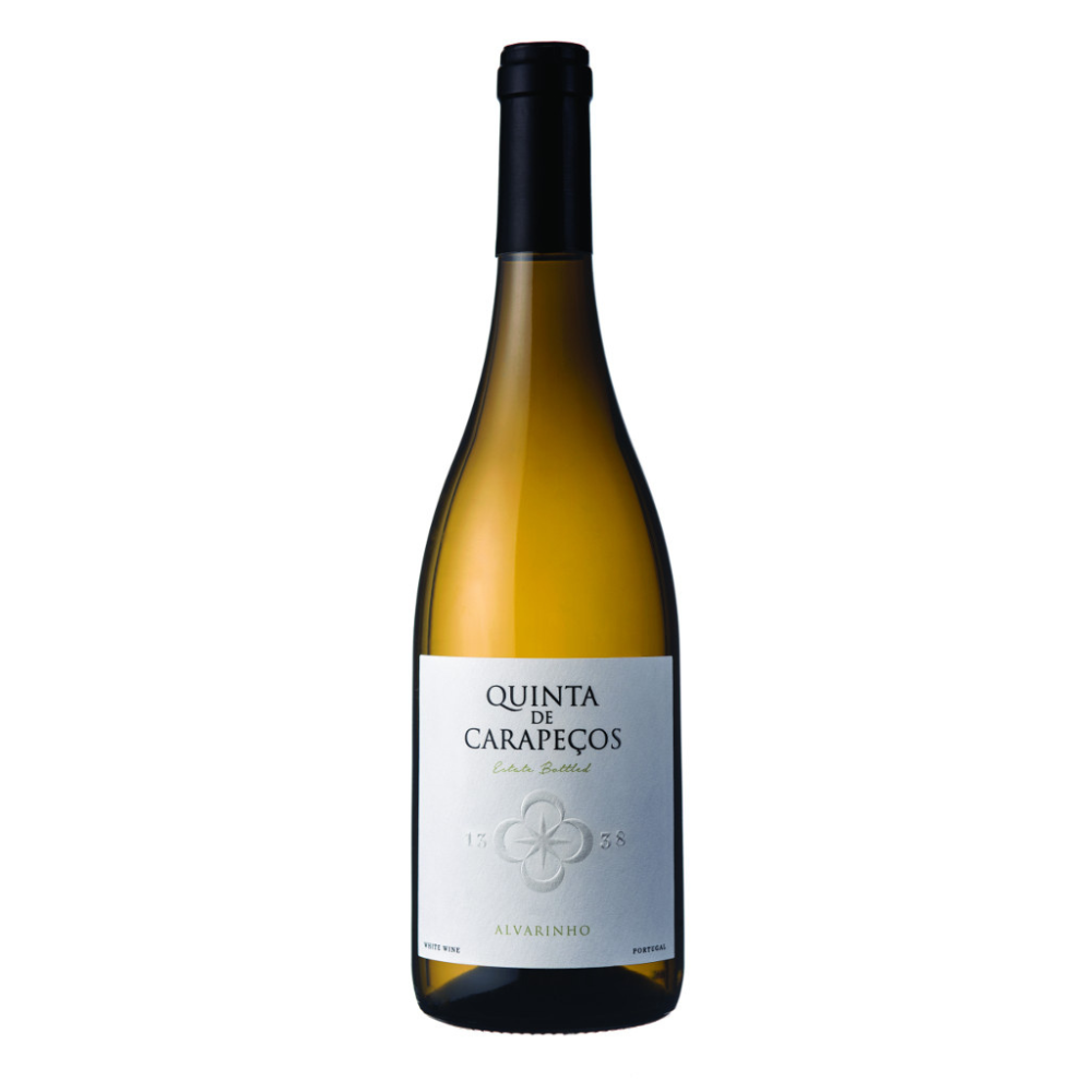 A bottle of Quinta de Caraçeos Alvarinho white wine, featuring a dark glass bottle with a black cap and a white label, set against a plain white background.